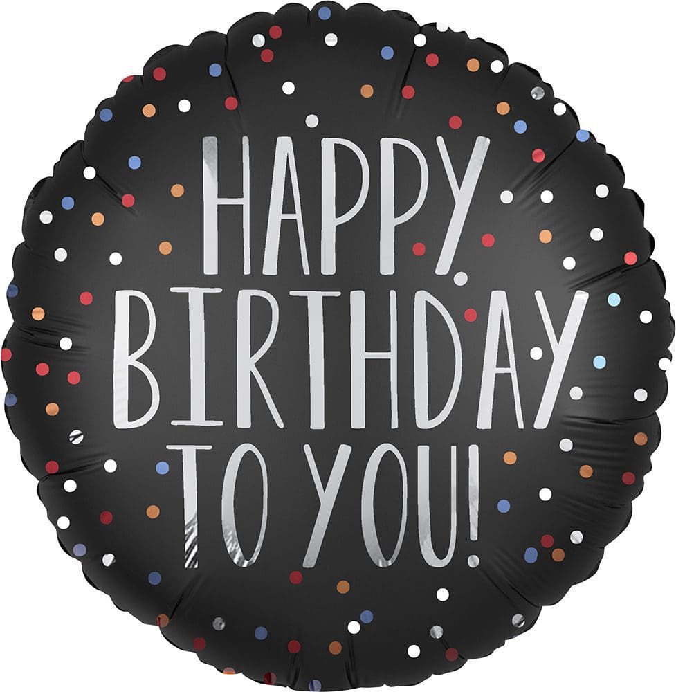 Black birthday balloon with colorful dots and white text.