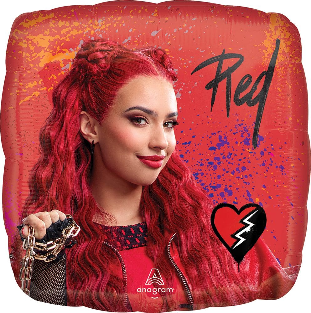 A woman with vibrant red hair and a confident expression poses in front of a red backdrop.