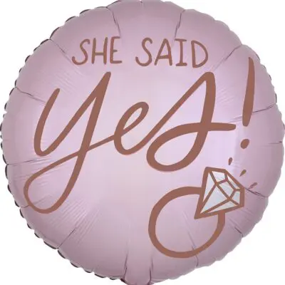 A pink balloon with 'She said YES!' and a diamond ring graphic.
