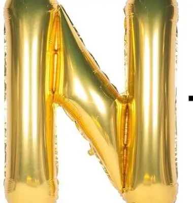 A shiny gold balloon shaped like the letter N.