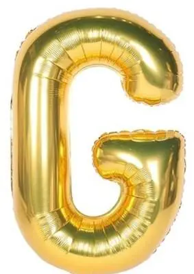 A shiny gold foil balloon shaped like the letter G.