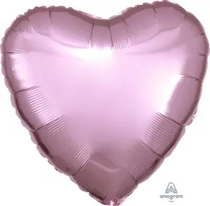 A shiny pink heart-shaped balloon.