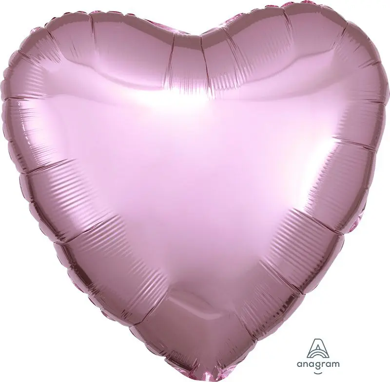 A shiny pink heart-shaped balloon.