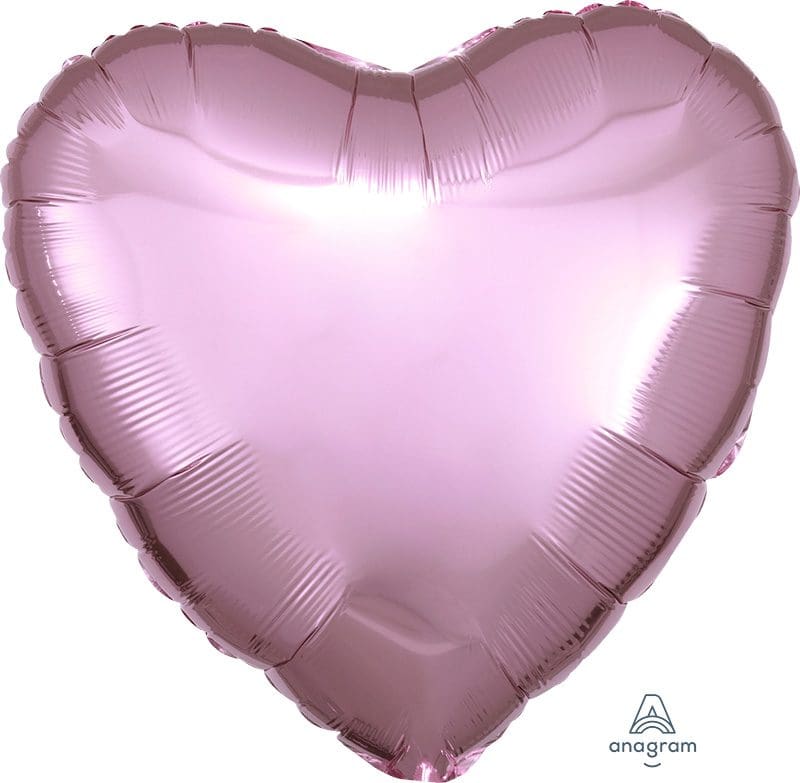 A shiny pink heart-shaped balloon.